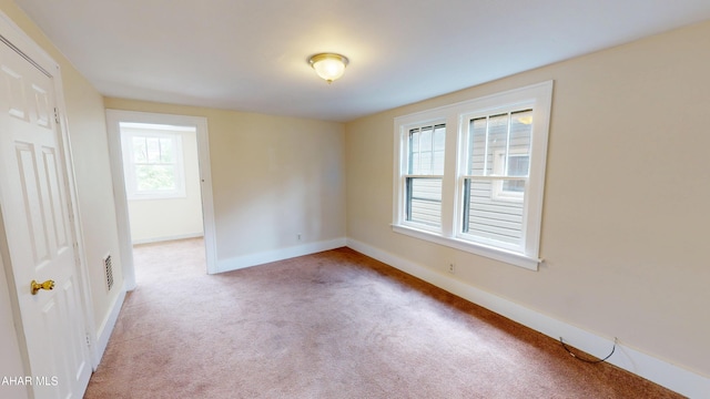 1113 Broadway, Altoona, PA 16601 - empty room with light colored carpet and baseboards
