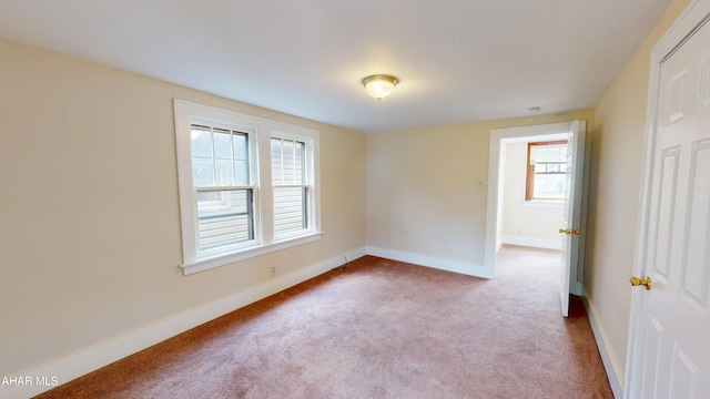 1113 Broadway, Altoona, PA 16601 - empty room featuring carpet and healthy amount of natural light