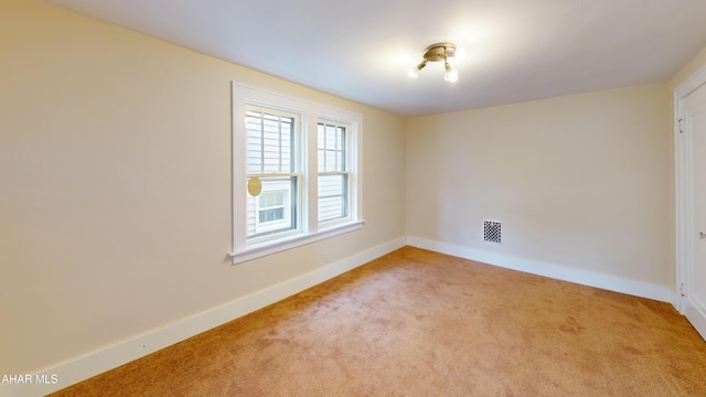 1113 Broadway, Altoona, PA 16601 - carpeted empty room featuring baseboards
