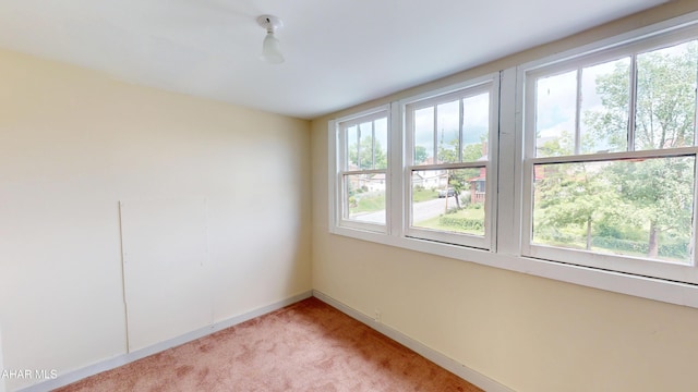 1113 Broadway, Altoona, PA 16601 - empty room featuring light carpet and baseboards