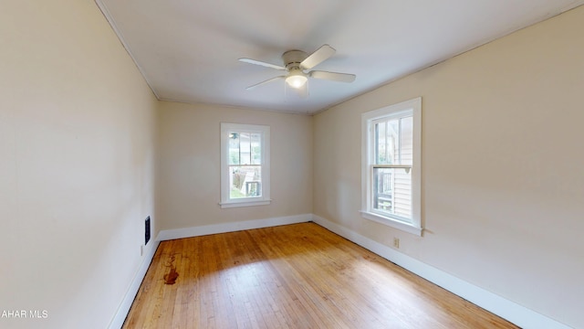 1113 Broadway, Altoona, PA 16601 - unfurnished room featuring light wood-style flooring and a ceiling fan