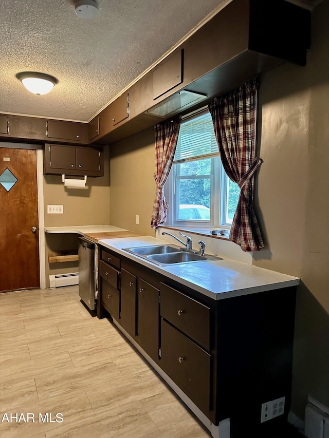 kitchen with a textured ceiling, stainless steel dishwasher, a baseboard heating unit, and sink