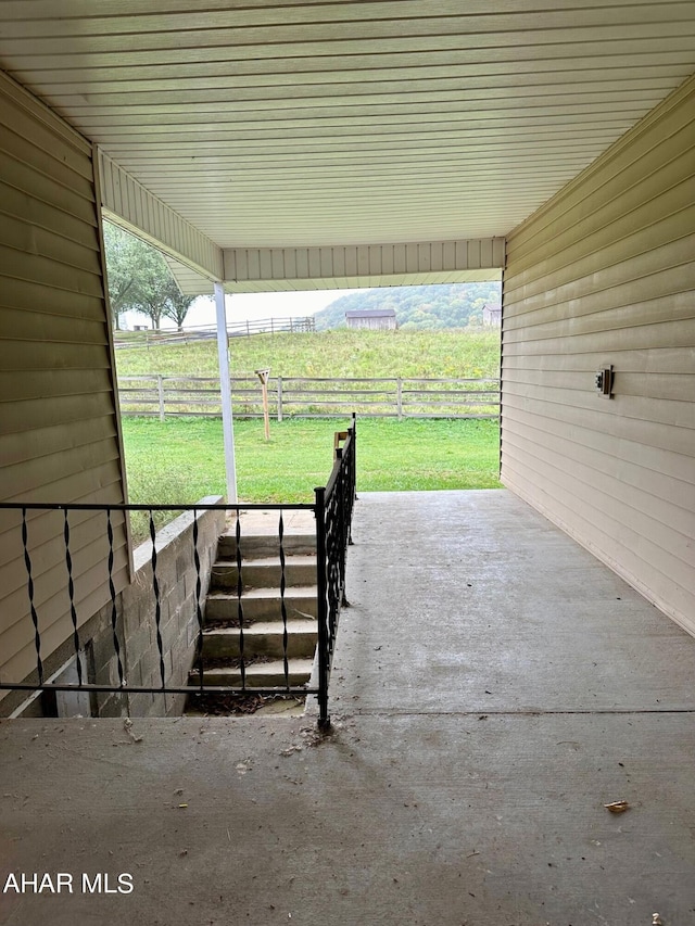 view of patio with a rural view