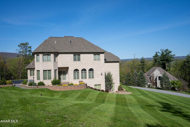 219 Scenic Pine Dr, Hollidaysburg, PA 16648 - back of property featuring a yard and brick siding