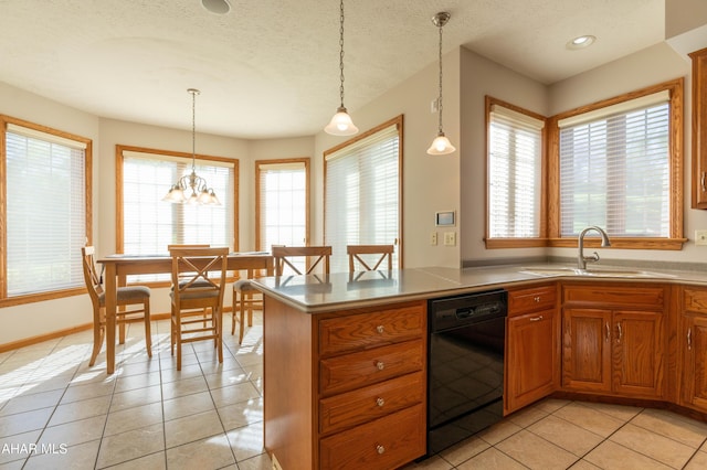 219 Scenic Pine Dr, Hollidaysburg, PA 16648 - kitchen featuring dishwasher, brown cabinetry, light tile patterned floors, a sink, and pendant lighting