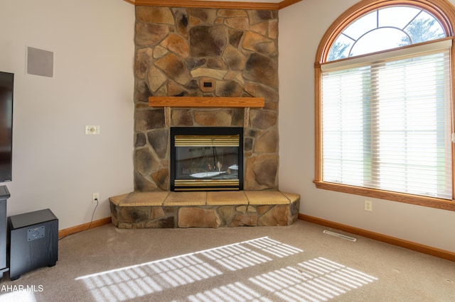 219 Scenic Pine Dr, Hollidaysburg, PA 16648 - carpeted living area featuring baseboards and a stone fireplace