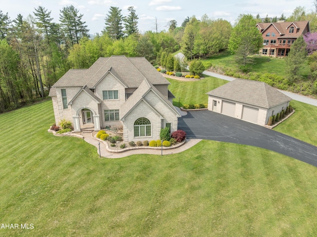 219 Scenic Pine Dr, Hollidaysburg, PA 16648 - view of front of property featuring stone siding, a front lawn, and an outbuilding