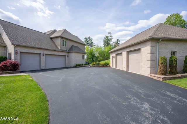 219 Scenic Pine Dr, Hollidaysburg, PA 16648 - view of side of property with brick siding and a shingled roof