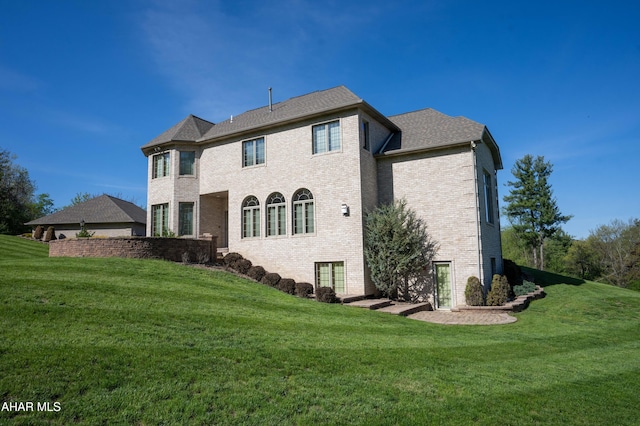 219 Scenic Pine Dr, Hollidaysburg, PA 16648 - rear view of property with brick siding and a yard