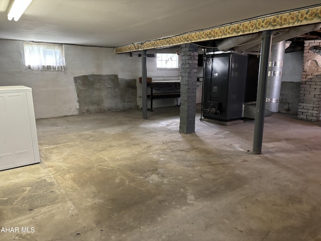 basement with washer / clothes dryer and plenty of natural light