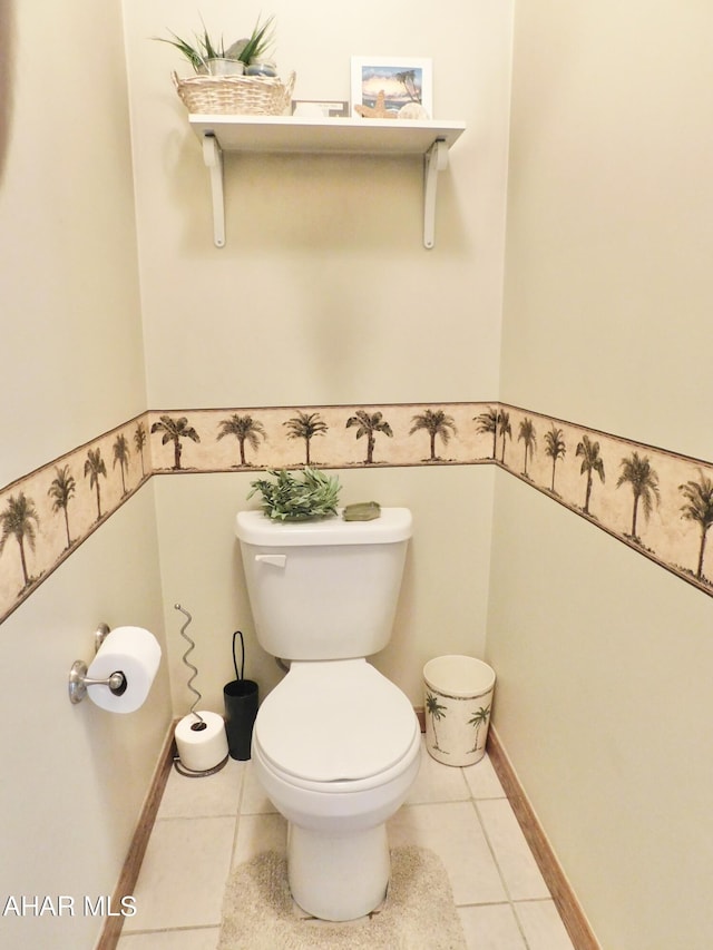 bathroom with tile patterned floors and toilet