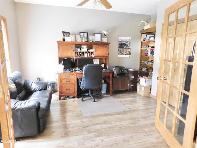 office space with ceiling fan, french doors, and light hardwood / wood-style flooring