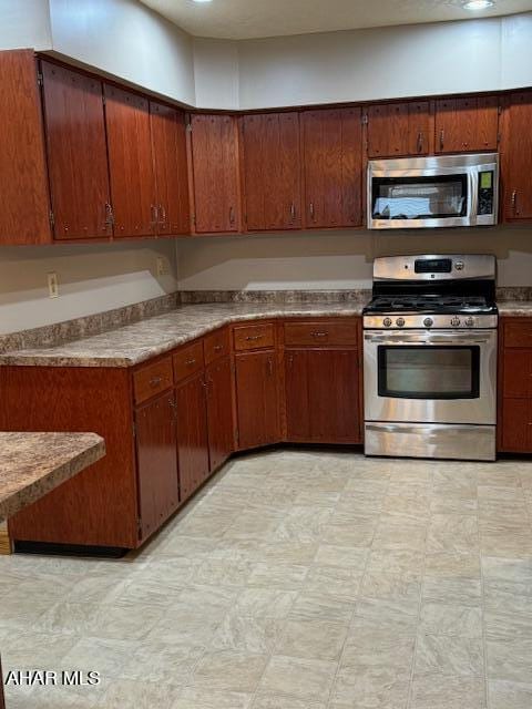 kitchen with appliances with stainless steel finishes