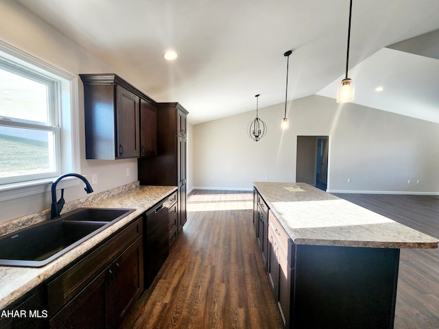 kitchen featuring pendant lighting, dishwasher, a center island, lofted ceiling, and dark wood-type flooring