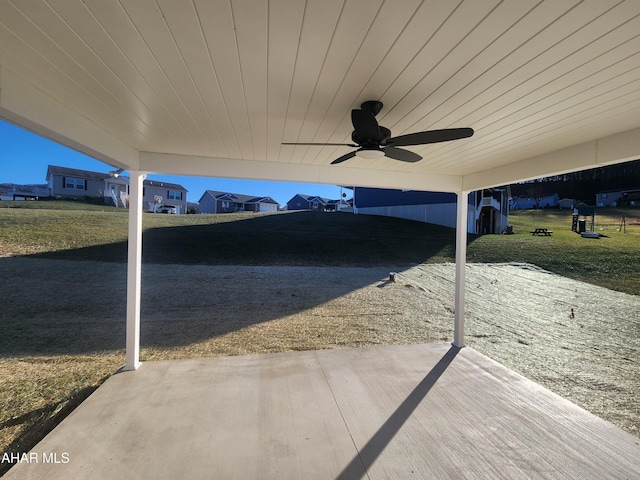 view of patio / terrace featuring ceiling fan