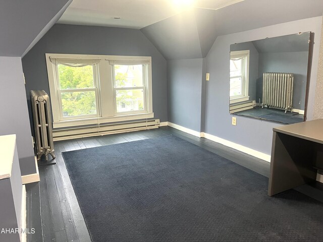 1008 N 3rd St, Altoona, PA 16601 - bonus room featuring radiator heating unit, baseboard heating, dark wood finished floors, and lofted ceiling