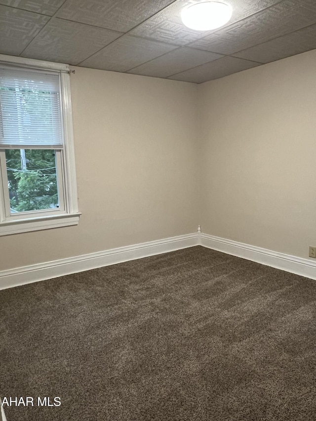1008 N 3rd St, Altoona, PA 16601 - empty room featuring dark carpet and a drop ceiling