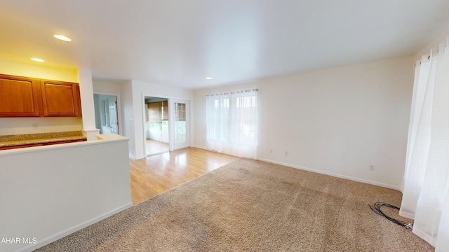 904 Holliday Hills Dr, Hollidaysburg, PA 16648 - unfurnished living room featuring light colored carpet and recessed lighting