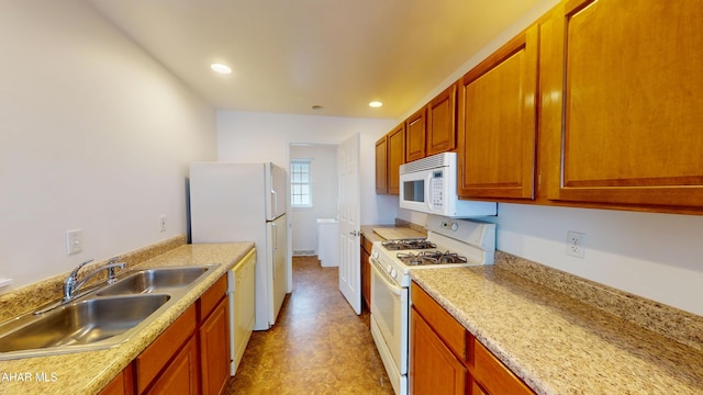 904 Holliday Hills Dr, Hollidaysburg, PA 16648 - kitchen featuring white appliances, light countertops, recessed lighting, brown cabinets, and light flooring