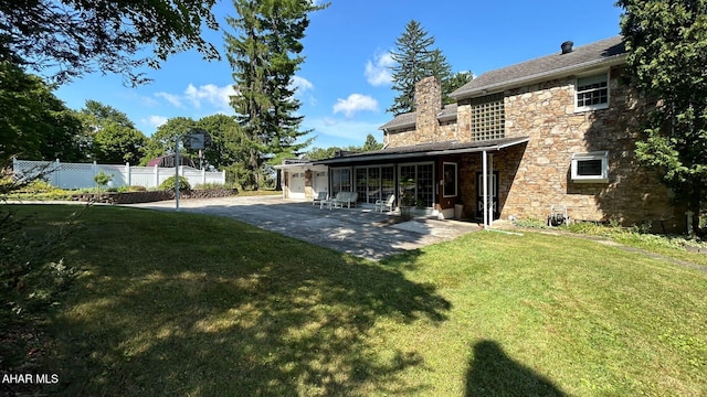 view of yard with a patio and fence