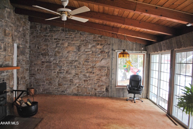 unfurnished office with carpet floors, wood ceiling, a fireplace, and lofted ceiling with beams