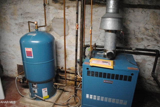 utility room featuring a heating unit