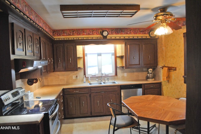 kitchen featuring decorative backsplash, appliances with stainless steel finishes, light countertops, dark brown cabinets, and a sink