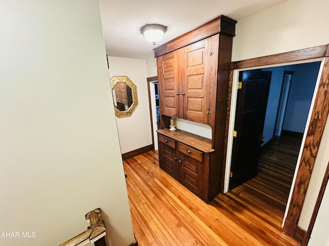 hallway featuring light hardwood / wood-style flooring