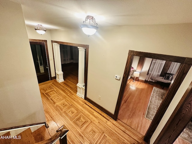 hallway featuring light hardwood / wood-style flooring