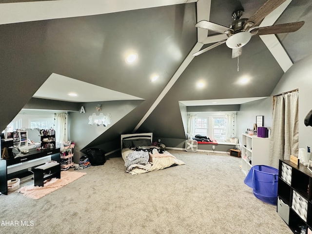 playroom featuring vaulted ceiling, ceiling fan, and carpet floors