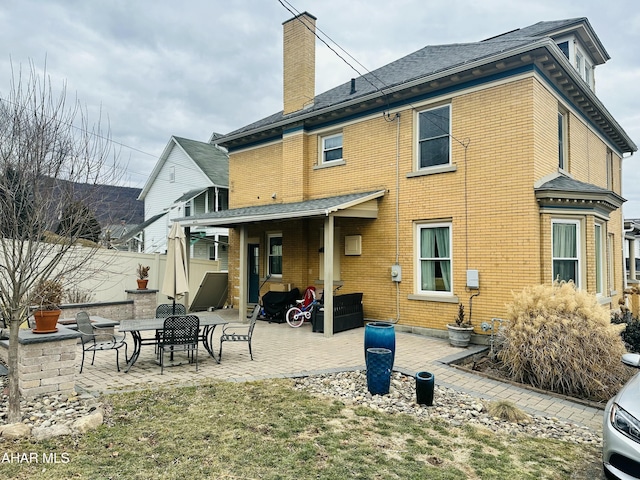 back of house featuring a patio