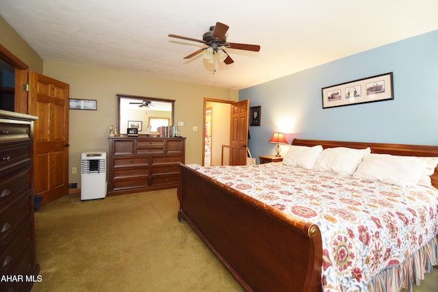 bedroom featuring light carpet and ceiling fan