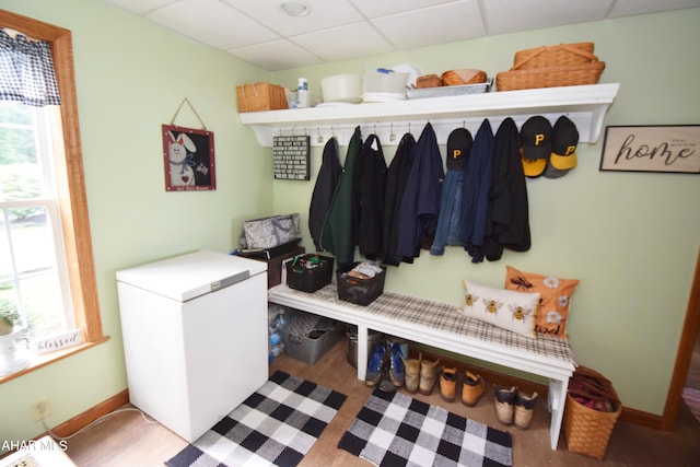 mudroom featuring a paneled ceiling and light hardwood / wood-style flooring