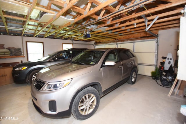 garage featuring a garage door opener