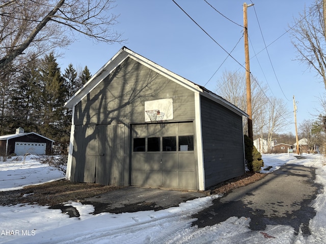 view of snow covered garage