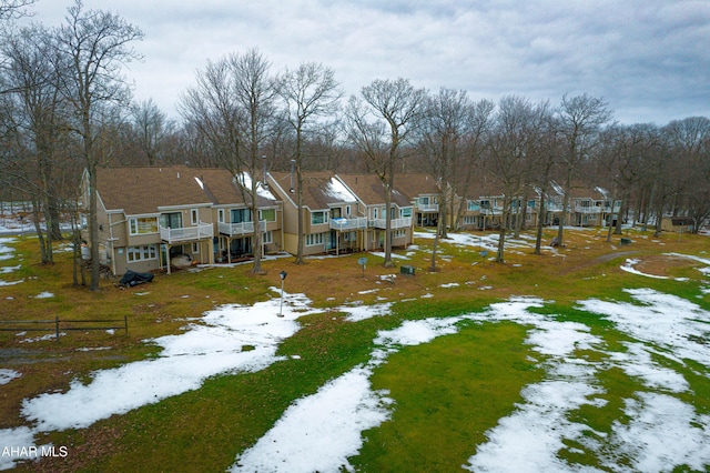 view of yard layered in snow