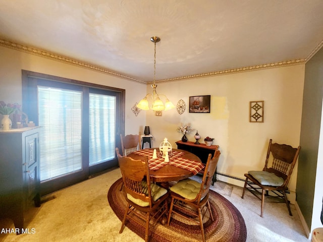 dining room with a chandelier and light colored carpet