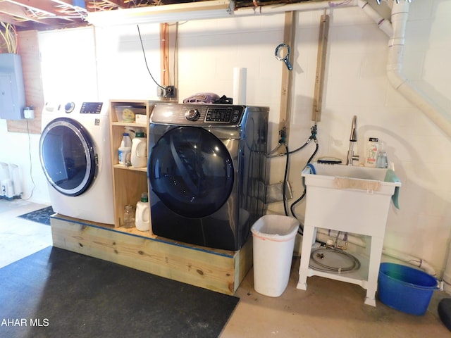 3004 Homers Gap Rd, Altoona, PA 16601 - laundry room featuring washing machine and clothes dryer, electric panel, and concrete block wall