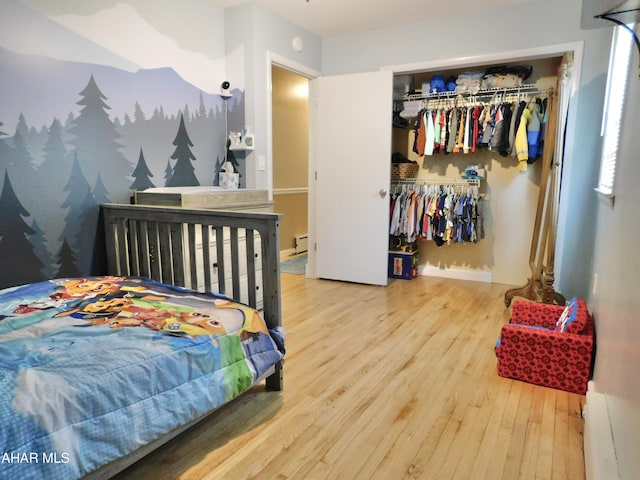 3004 Homers Gap Rd, Altoona, PA 16601 - bedroom featuring wood finished floors, a closet, and a baseboard radiator