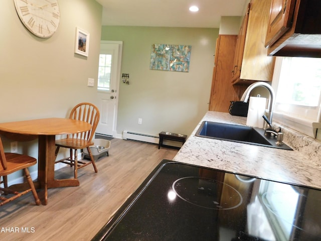 3004 Homers Gap Rd, Altoona, PA 16601 - kitchen with brown cabinets, light wood-style floors, and recessed lighting