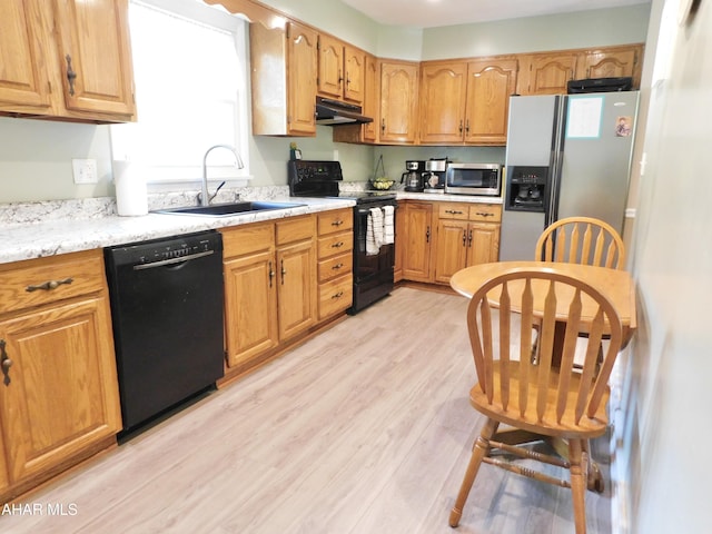3004 Homers Gap Rd, Altoona, PA 16601 - kitchen featuring black appliances, under cabinet range hood, and light wood finished floors