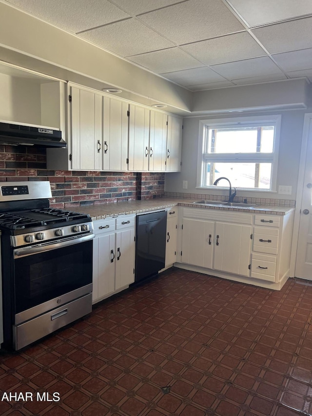 kitchen with white cabinetry, sink, black dishwasher, extractor fan, and stainless steel range with gas stovetop