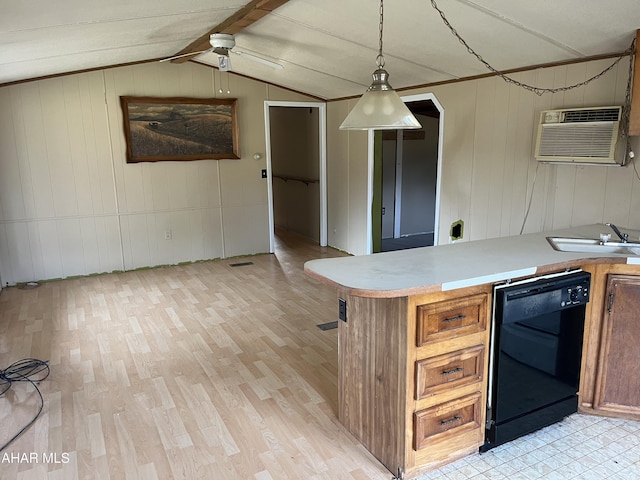 kitchen featuring a wall mounted air conditioner, light wood-type flooring, sink, dishwasher, and vaulted ceiling with beams