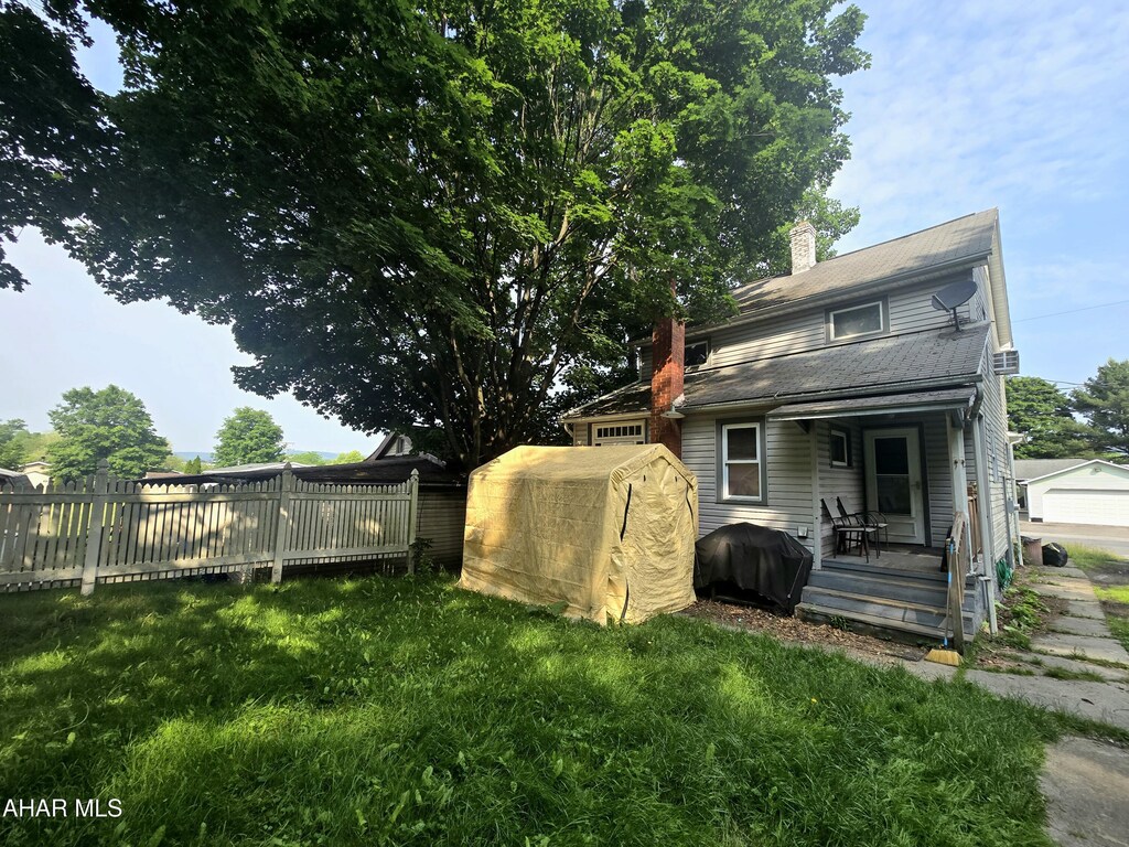 184 Sandy Run Rd, Altoona, PA 16601 - rear view of house featuring a chimney and an outdoor structure