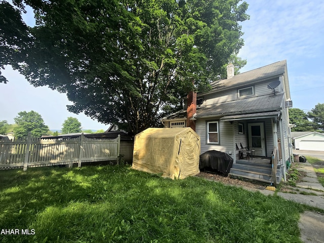 184 Sandy Run Rd, Altoona, PA 16601 - rear view of house featuring a chimney and an outdoor structure