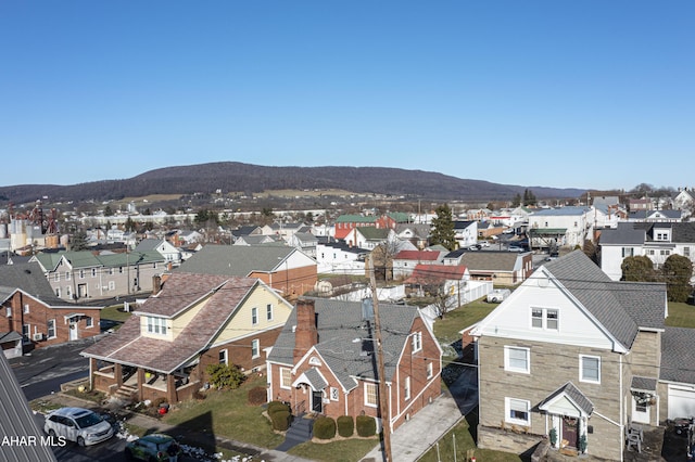 bird's eye view with a mountain view