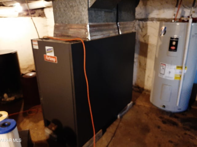 utility room featuring electric water heater