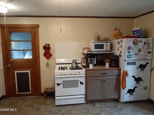 kitchen with gray cabinetry, crown molding, and white appliances