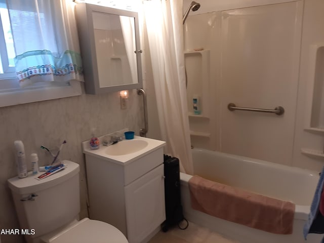 full bathroom featuring vanity, toilet, and shower / tub combo