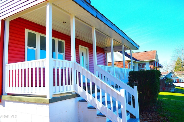 exterior space featuring covered porch